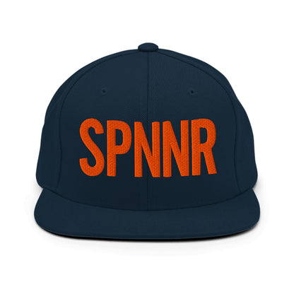 Spinner Snapback The Links Navy Orange golf hat – front view